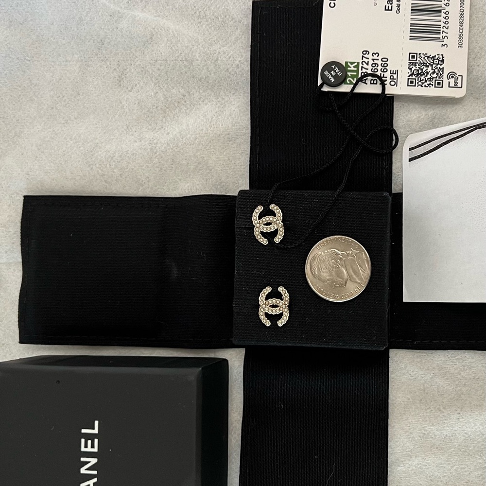 Authentic Chanel NWT CC logo studs champagne gold metal with mini pearls.
